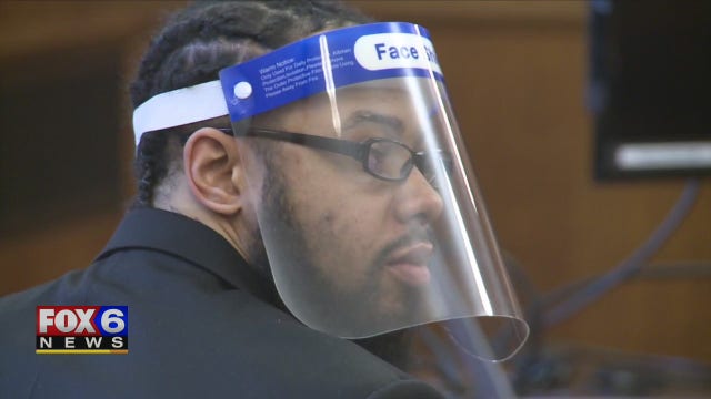 'Gun pointed at me:' Witness describes robbery before officer's killing