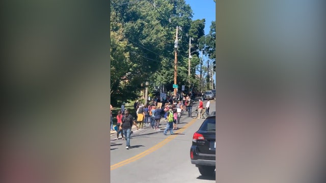 Protesters gather outside Mitch McConnell’s home amid pushes to fill late Justice Ruth Bader Ginsburg’s seat