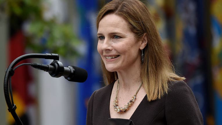 FILE - Judge Amy Coney Barrett speaks after being nominated to the US Supreme Court by President Donald Trump in the Rose Garden of the White House in Washington, DC on September 26, 2020. 