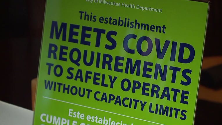 Milwaukee Health Department placard denoting an approved COVID-19 safety plan for bars and restaurants