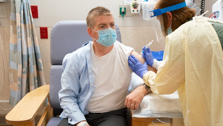 Dr. Jeff Pothof receives COVID-19 vaccine (Credit: UW Health)