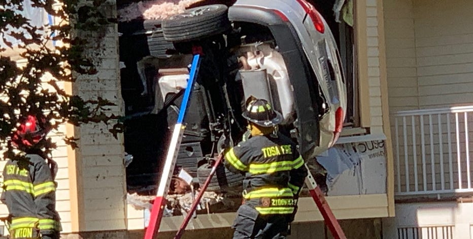 Car crashes into home near 64th and Meinecke