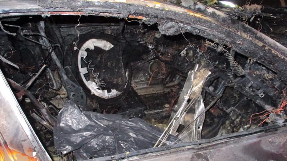 Aftermatch of fiery, roll-over crash in Winnebago County involving a driver suspected of OWI. (Credit: Wisconsin State Patrol)