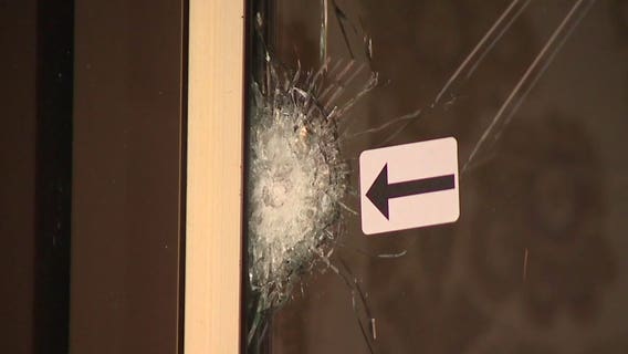 Man arrested in funeral home shooting that injured 7