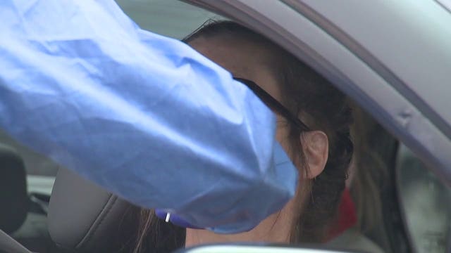 COVID-19 surge prompts change for businesses, hospitals