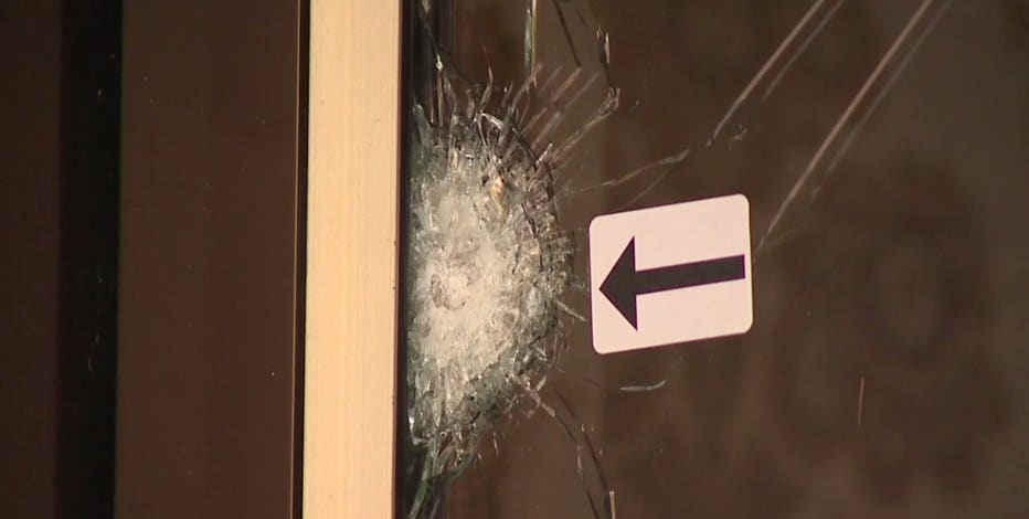 Man arrested in funeral home shooting that injured 7