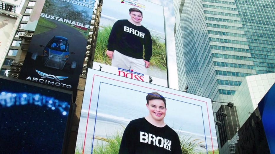 Brock Mielke appears on a Times Square jumbotron