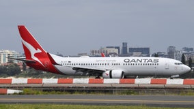 Qantas airline plans to require coronavirus vaccine for international travel, CEO says