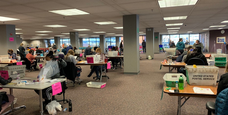 Volunteers begin process of counting absentee ballots in Milwaukee