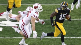 No. 25 Wisconsin loses at No. 19 Iowa 28-7