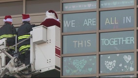 Santa, fire departments surprise kids at Children's Wisconsin