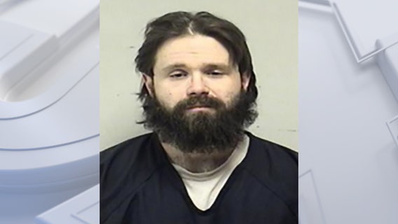 Kenosha police arrest man they say hit officer with vehicle