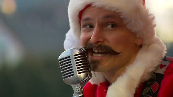 Musicians perform impromptu concerts from Christmas Caravan