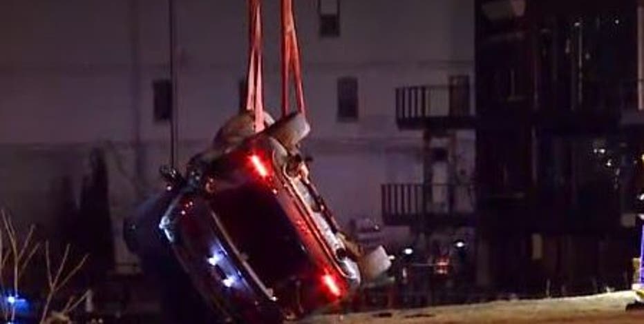 Pursuit ends in crash along Milwaukee River, 2 rescued, 1 sought