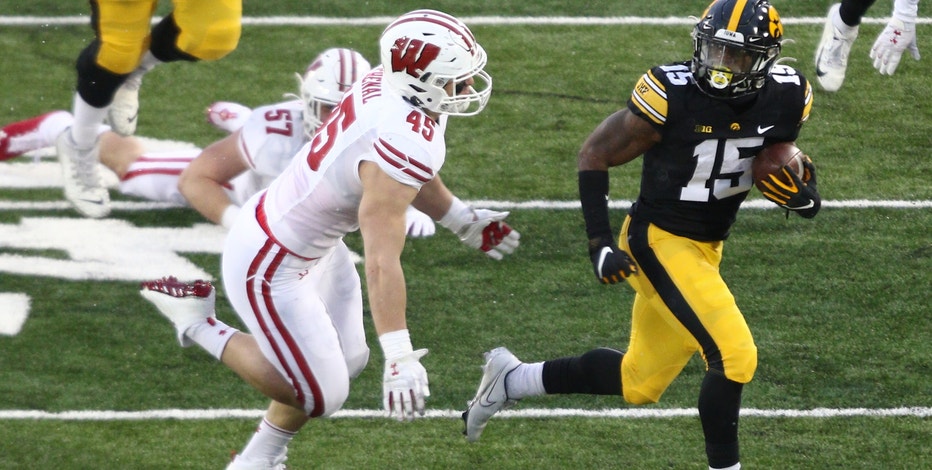No. 25 Wisconsin loses at No. 19 Iowa 28-7