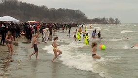 Tradition stands: Polar bear plungers take Bradford Beach by storm