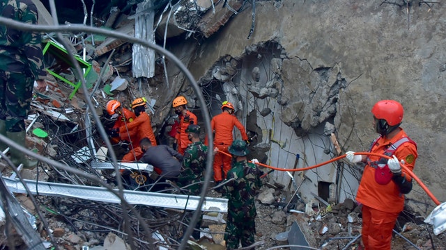 At least 42 dead as Indonesia earthquake topples homes, buildings