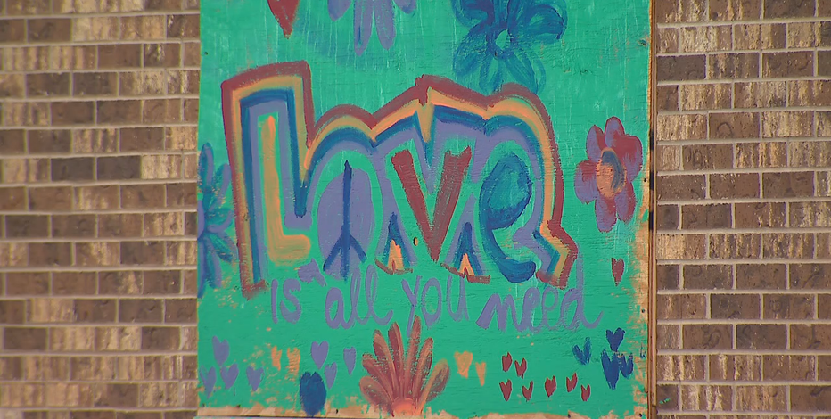 Boards come down in Kenosha, to be featured in art gallery