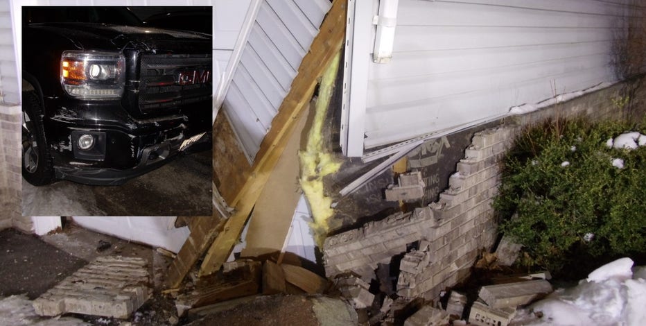 Man taken into custody for OWI after crashing into apartment building