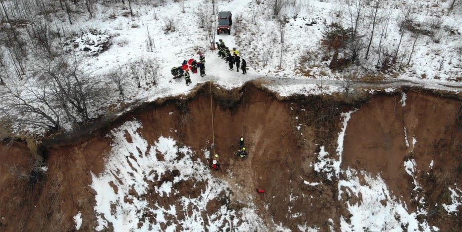 Grafton rescue 2 women, dog from muddy bluff in Lions Den Park