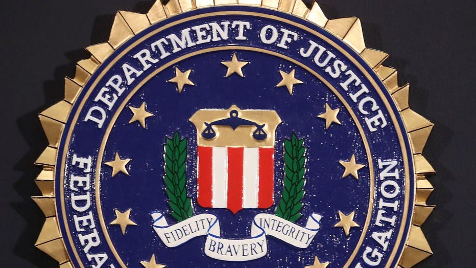The FBI seal is attached to a podium prior to Director Christopher Wray speaking at a news conference at FBI Headquarters, on June 14, 2018 in Washington, D.C. (Photo by Mark Wilson/Getty Images)