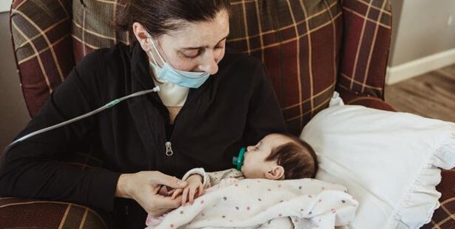 WI mom who gave birth in coma holds newborn after beating COVID