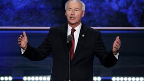 Arkansas governor signs legislation banning nearly all abortions in the state