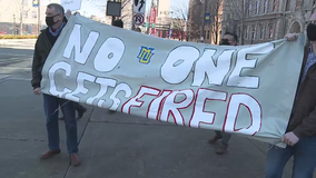 Group protests Marquette layoffs, calls for worker reinstatement