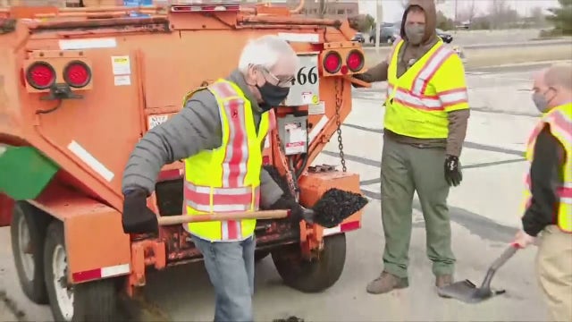 Gov. Evers fixes potholes in effort to promote transportation budget
