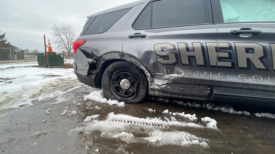 Racine County squad, tow truck struck by vehicle while on scene of crash