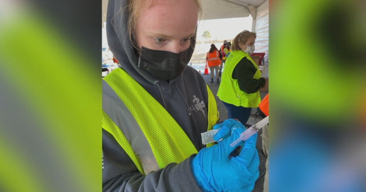 Meet the people behind the masks at vaccine site in Milwaukee | FOX6 ...