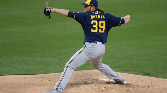Burnes fans 10 straight to tie record, Brewers rip Cubs 10-0
