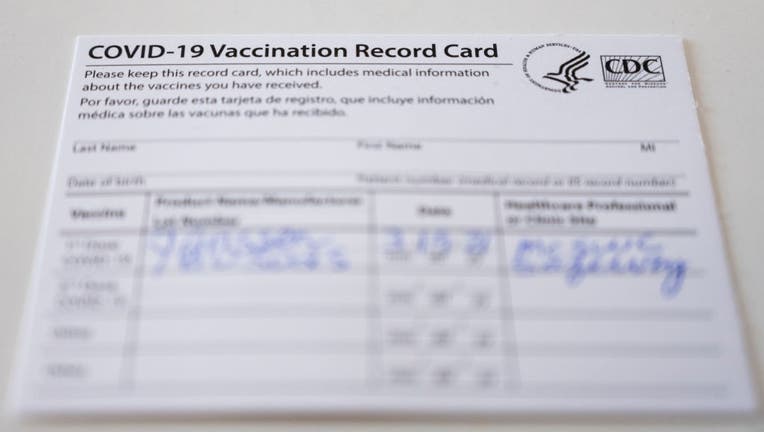 FILE - A COVID-19 vaccination record card issued by the U.S. Centers for Disease Control (Photo By Bill Clark/CQ-Roll Call, Inc via Getty Images)