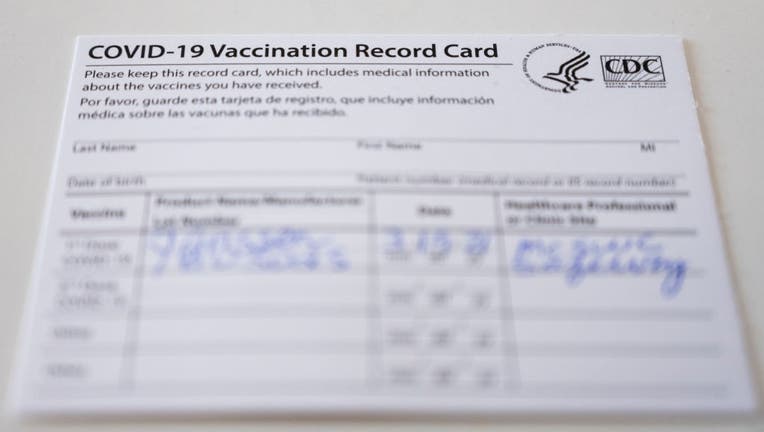 FILE - A COVID-19 vaccination record card issued by the U.S. Centers for Disease Control (Photo By Bill Clark/CQ-Roll Call, Inc via Getty Images)