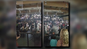 Phone flashlights save the day when power goes out during Texas graduation