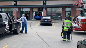 Car into Fox Point building, no injuries