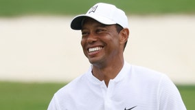 Tiger Woods spotted on crutches in rare appearance since crash, gives pep talk to athlete battling cancer