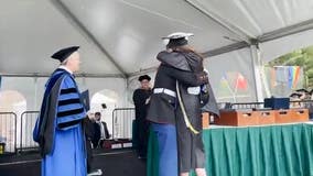 Video shows US Marine surprising sister at college graduation ceremony
