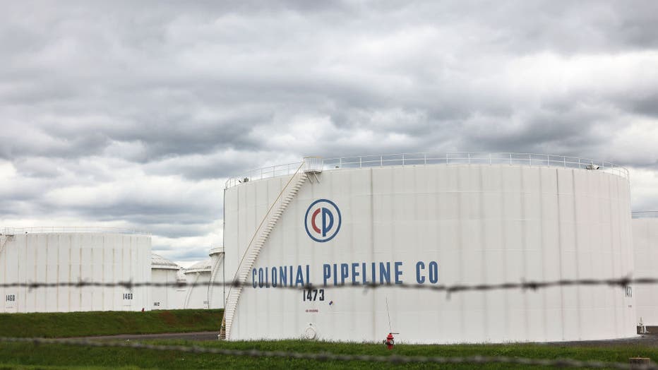 Fuel holding tanks are seen at Colonial Pipeline's Linden Junction Tank Farm on May 10, 2021 in Woodbridge, New Jersey. (Photo by Michael M. Santiago/Getty Images)