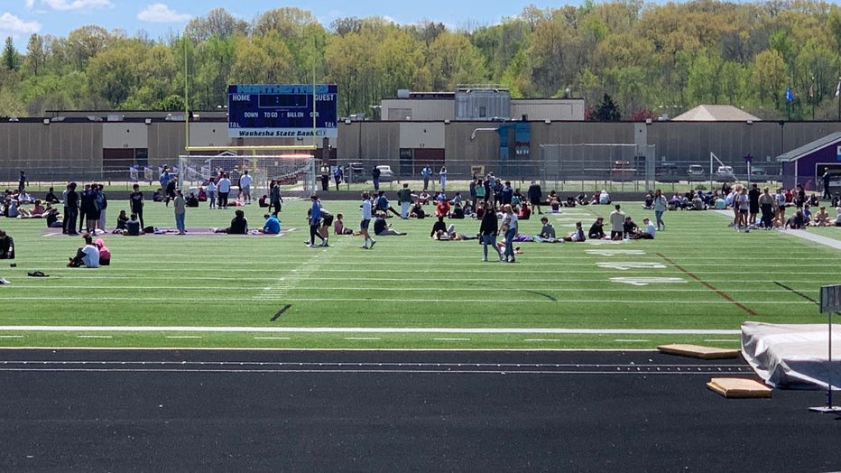 Students outdoors at Waukesha North HS after bomb threat