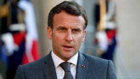French President Macron slapped in face during small town visit