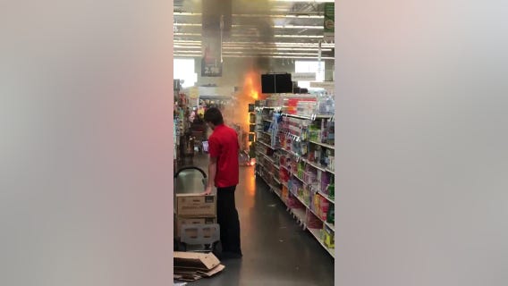 Teens light fireworks display inside Hy-Vee in Eagan, Minnesota