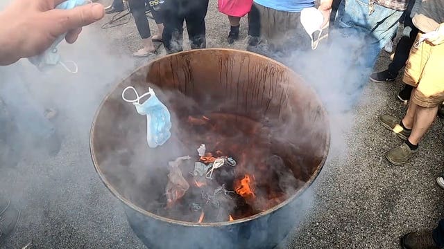 Masks burn as Milwaukee mandate ends