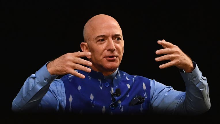 CEO of Amazon Jeff Bezos (R) gestures as he addresses the Amazon's annual Smbhav event in New Delhi on Jan. 15, 2020. (Photo by SAJJAD HUSSAIN/AFP via Getty Images)