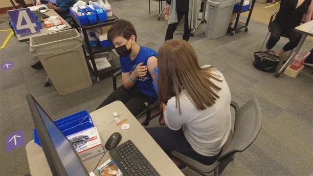 Tennessee halts COVID-19 vaccine outreach for minors, fires top official