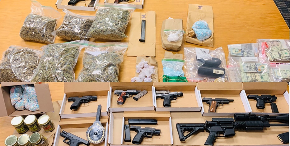 Meth, pot, guns in Milwaukee searches; 2 arrested