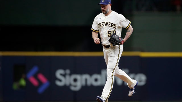 Brewers' Axford out for year after 1 game; Lauer on COVID list