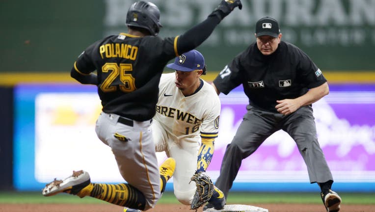 Brewers catch Pirates in 9th, beat them in 10th