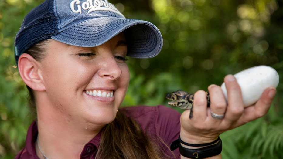 Chrissy-with-Baby-Gators-2021-2.jpg