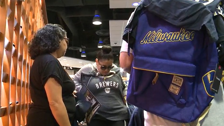 Brewers fans buy championship merchandise at Team Store